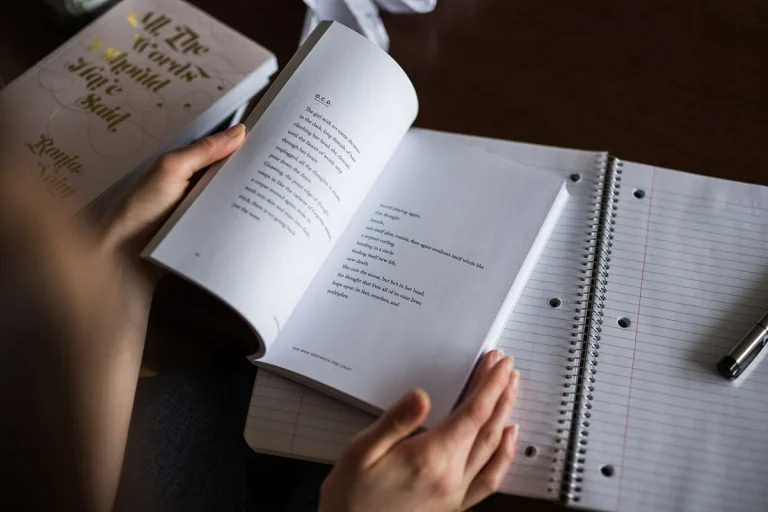 Person reading an open book, illustrating how to remember what you read